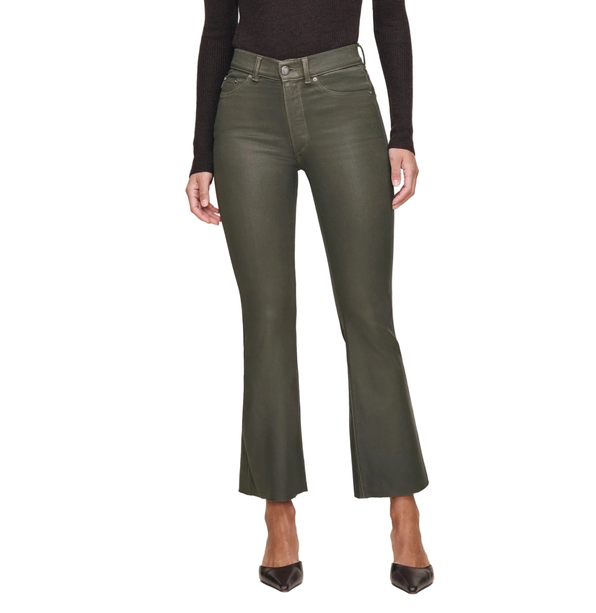 Person wearing a dark turtleneck and green pants on a white background