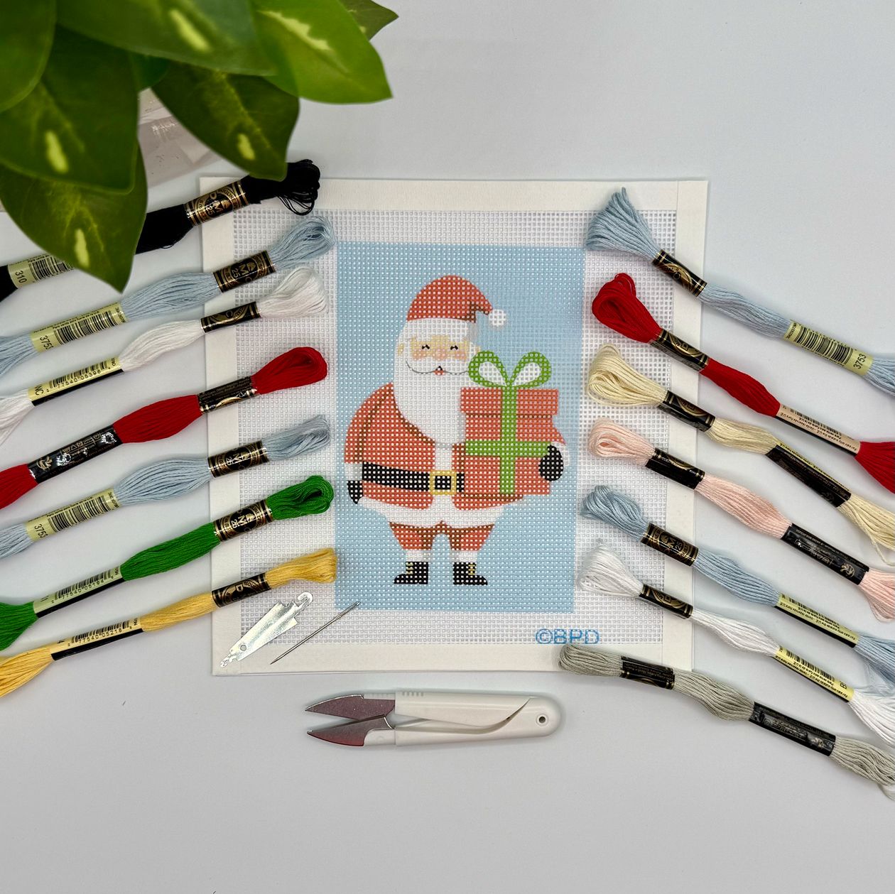 Blue Poppy Christmas Santa Needlepoint Design (Holding Present)